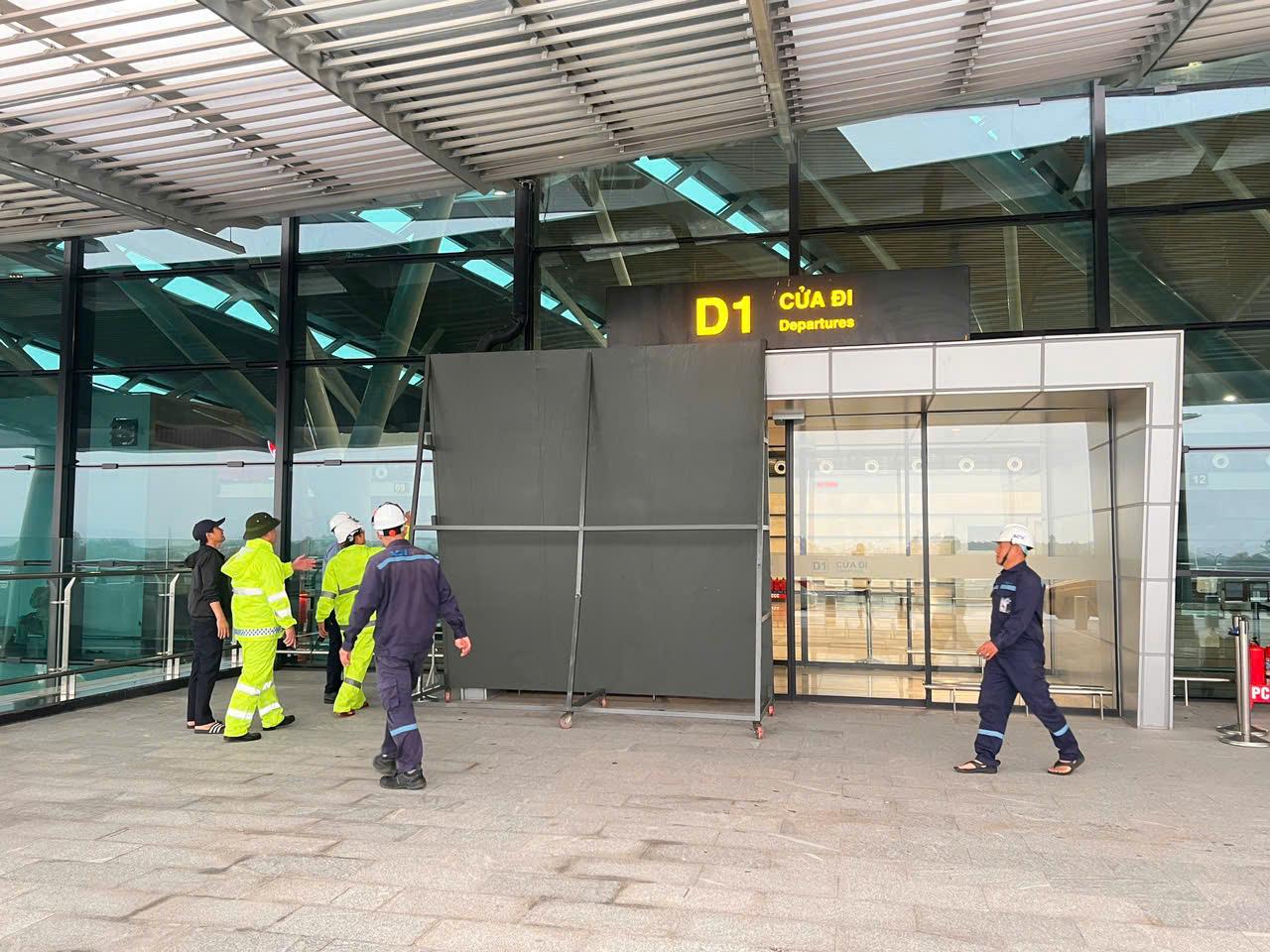 A group of people in safety gear outside a buildingDescription automatically generated