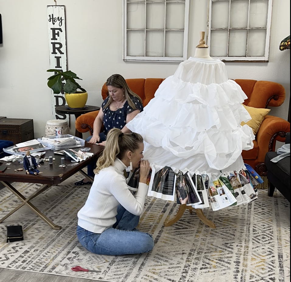 Mandy Penn Sewing Magazines onto the dress form
