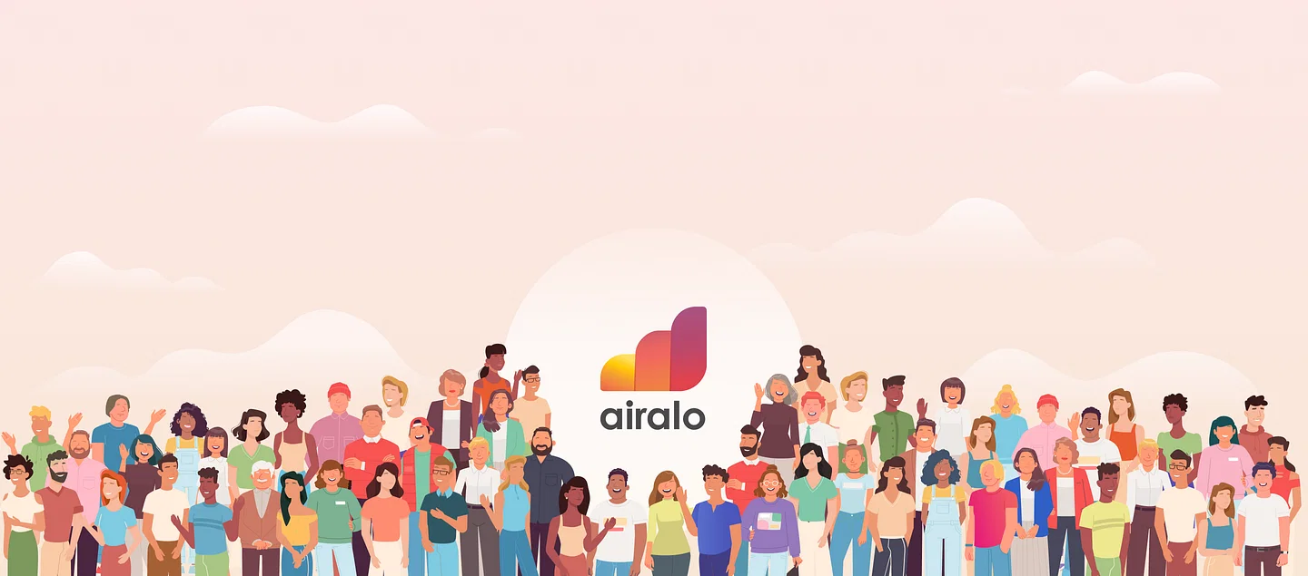 A large group of people standing together in front of a pink sky with a logo of Airalo