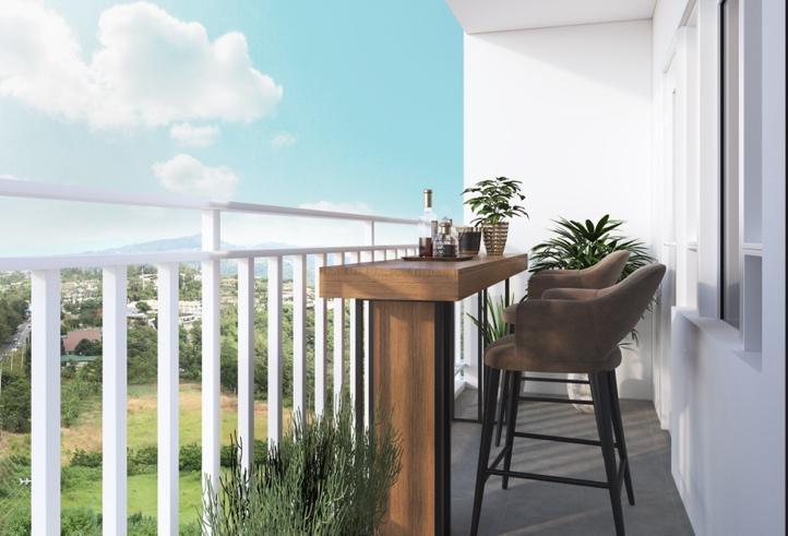 A balcony with a bar and chairs

Description automatically generated