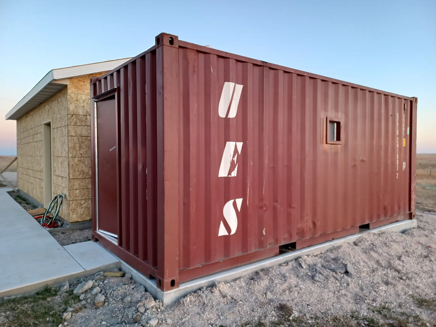 shipping container modified into tornado shelter 