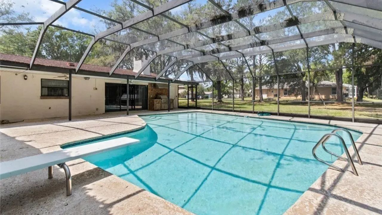 Character-Filled Home with Pool, Fireplace, and Expansive Yard in Crystal (Floor Plan Inside)