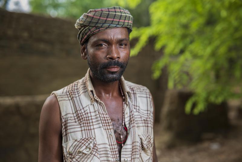 A photo of a small-scale cattle farmer from Yellapur. 