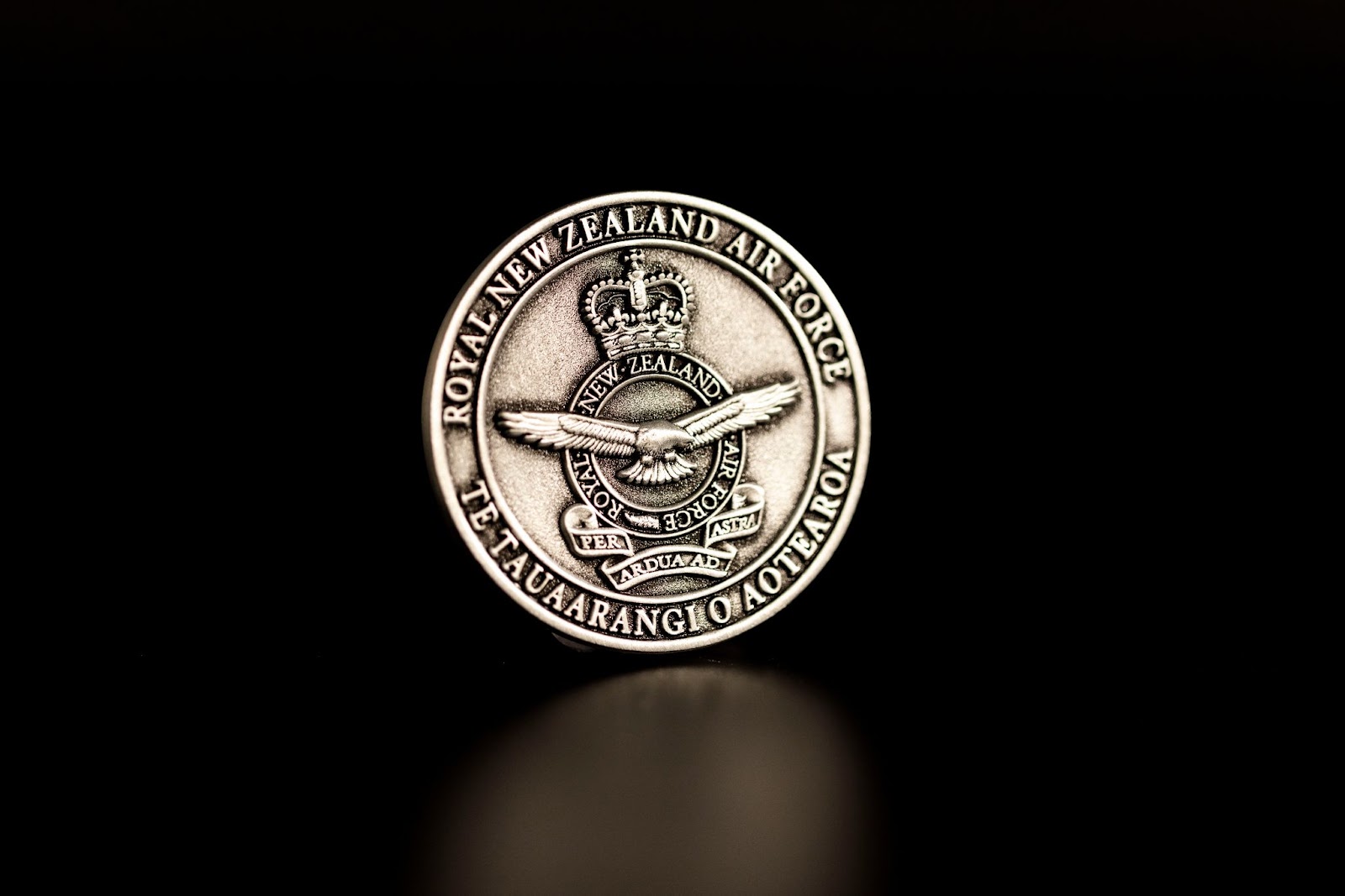 Close-up of a plain challenge coin edge.