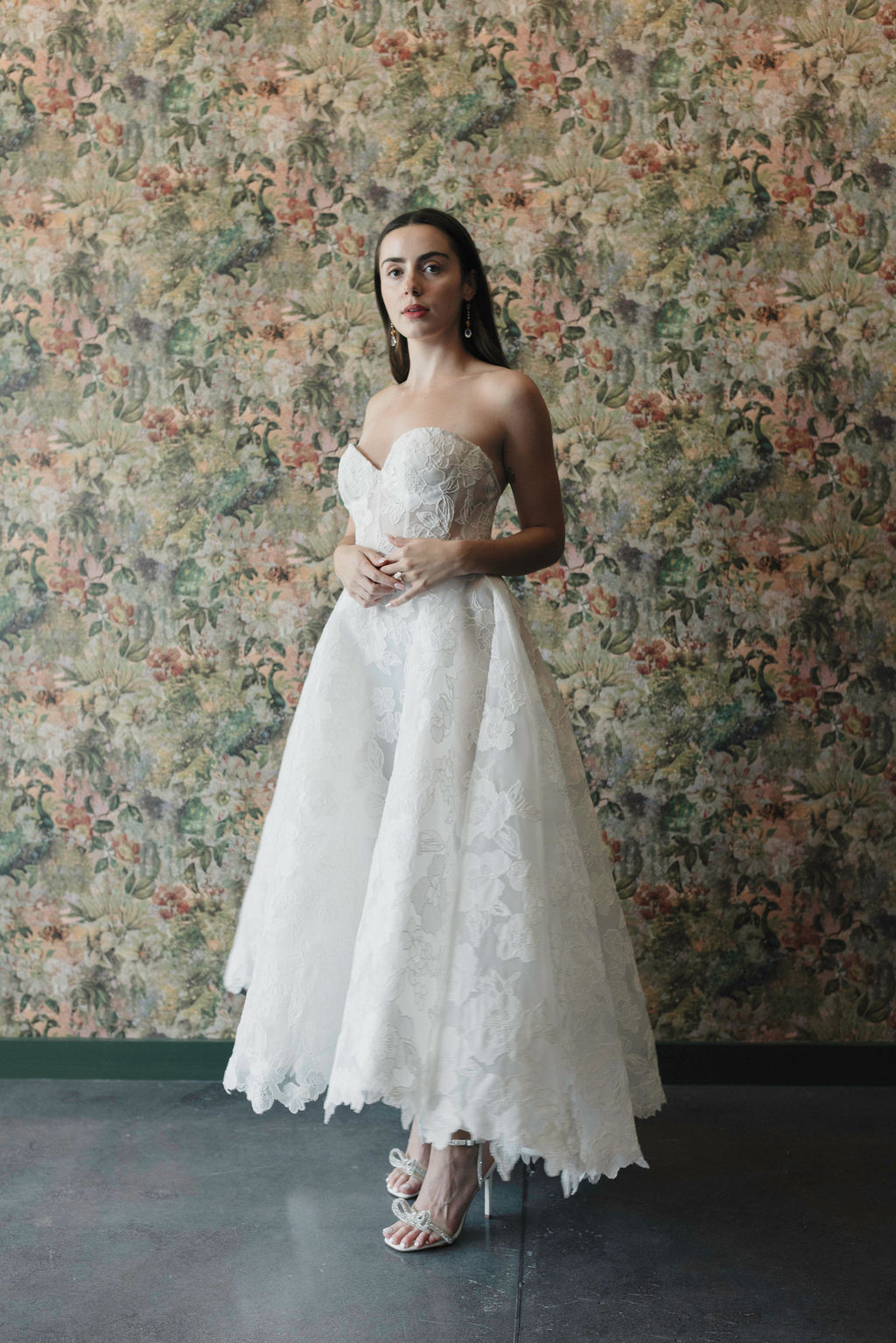 girl in mid length wedding dress 