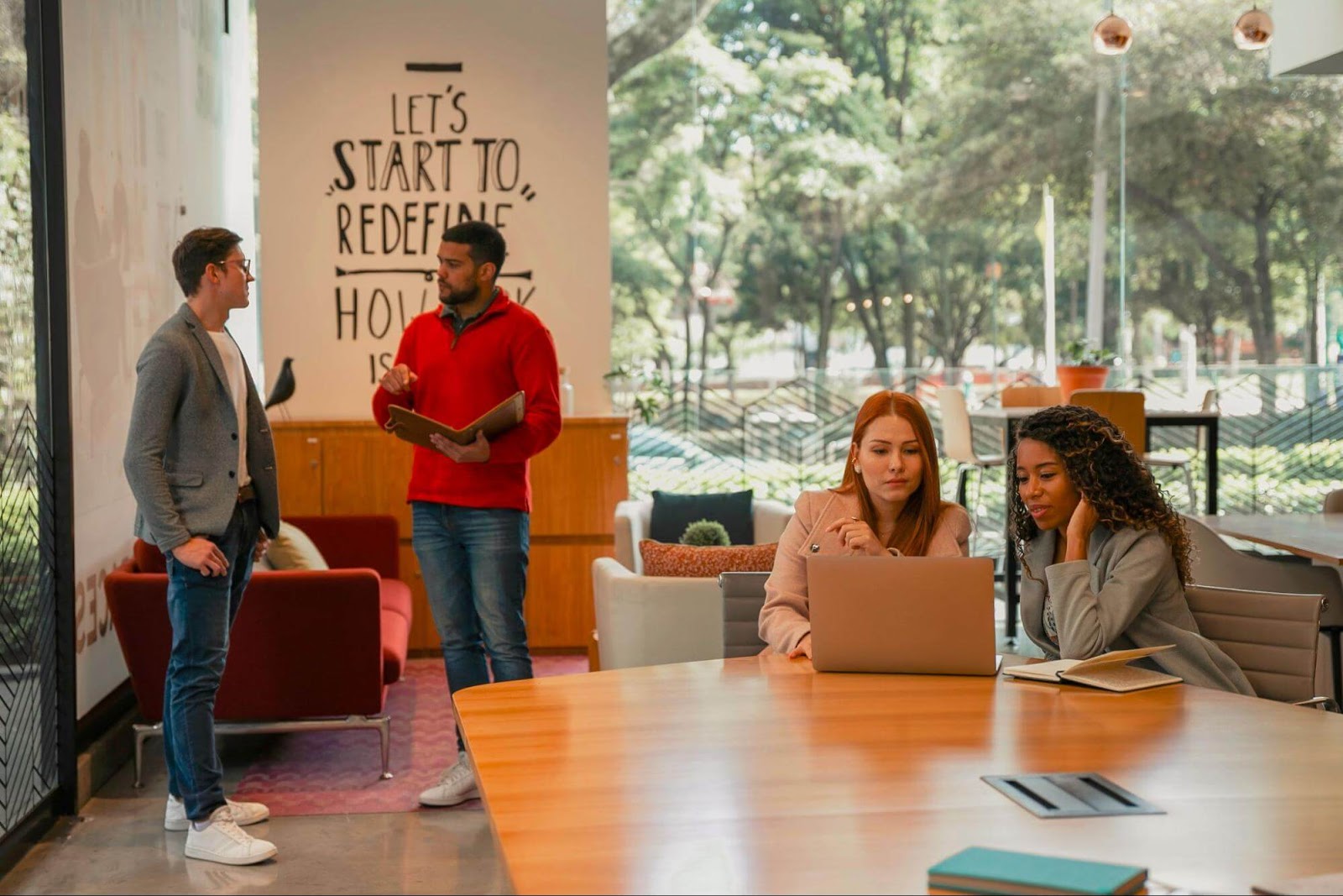 Work colleagues collaborating in an open space