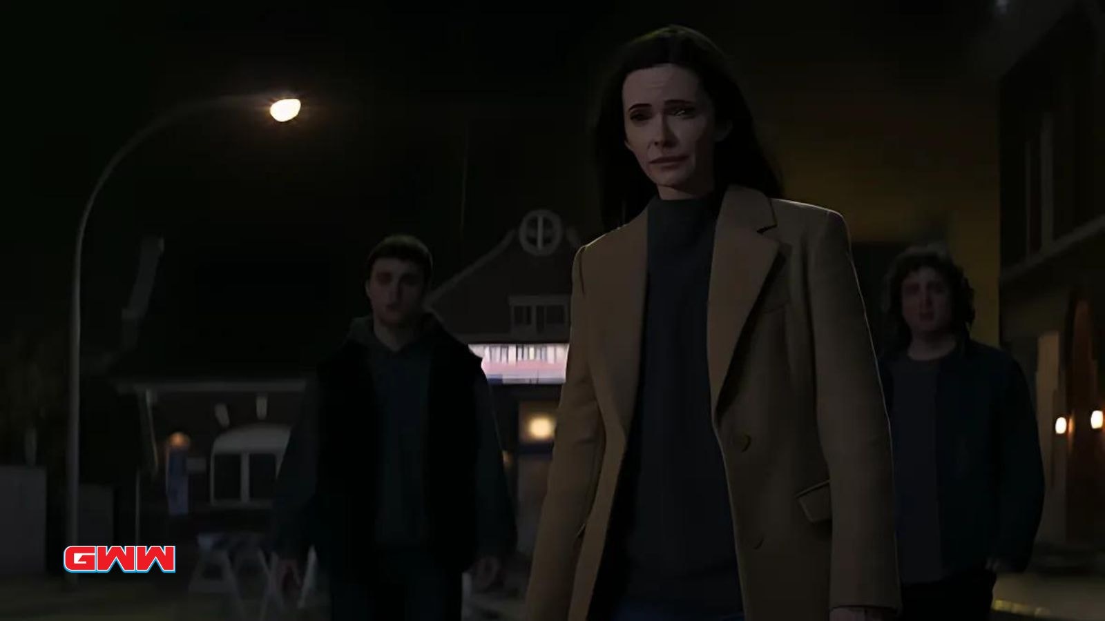  Elizabeth Tulloch as Lois Lane walking with Alex Garfin and Michael Bishop at night