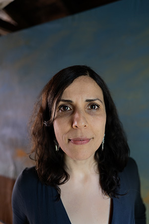 Headshot of Sadiqa de Meijer. She smiles slightly at the camera.