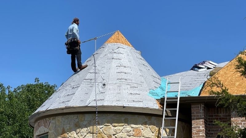 a working roofer from Pickle Roofing Solutions