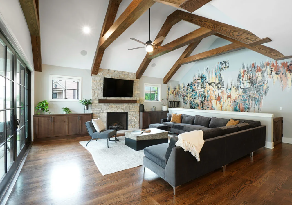 An old fireplace sitting beneath a mounted TV topper