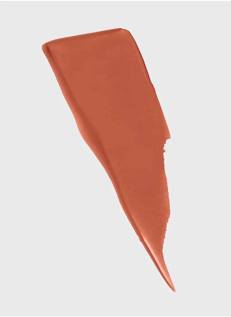 Warm terracotta swipe from the Maybelline matte lipstick collection — lightweight, pigmented, and modern.