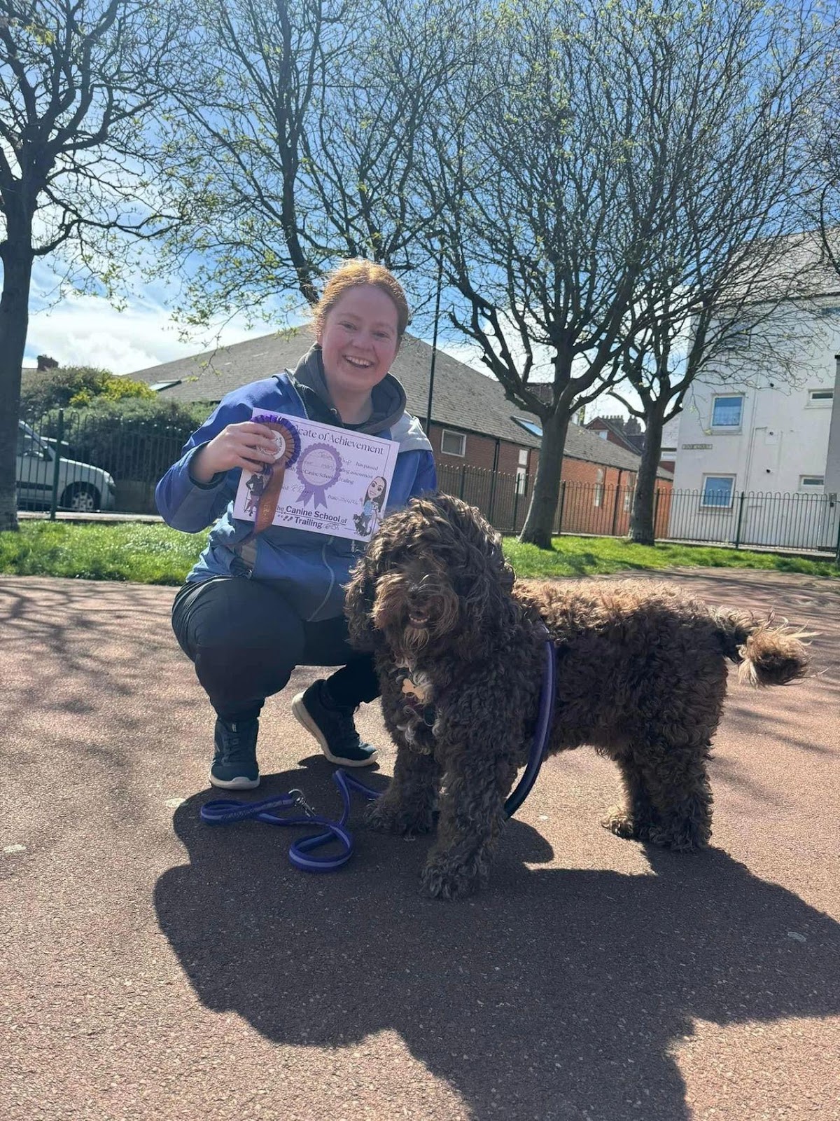 Rebecca and her dog Chip after passing their beginner man trail assessment in Cullercoats