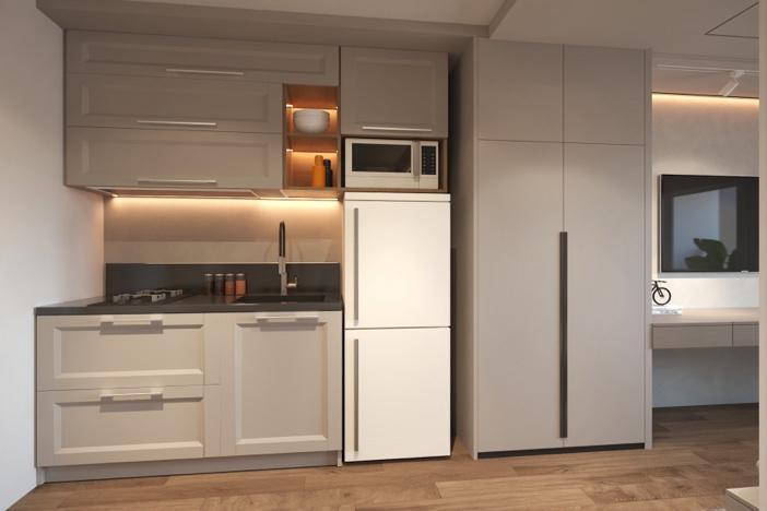 A kitchen with white cabinets and a microwave

Description automatically generated