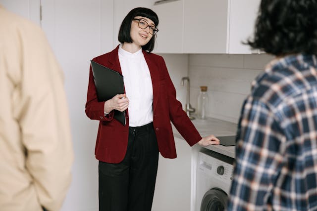 Realtor showing home to prospective buyers