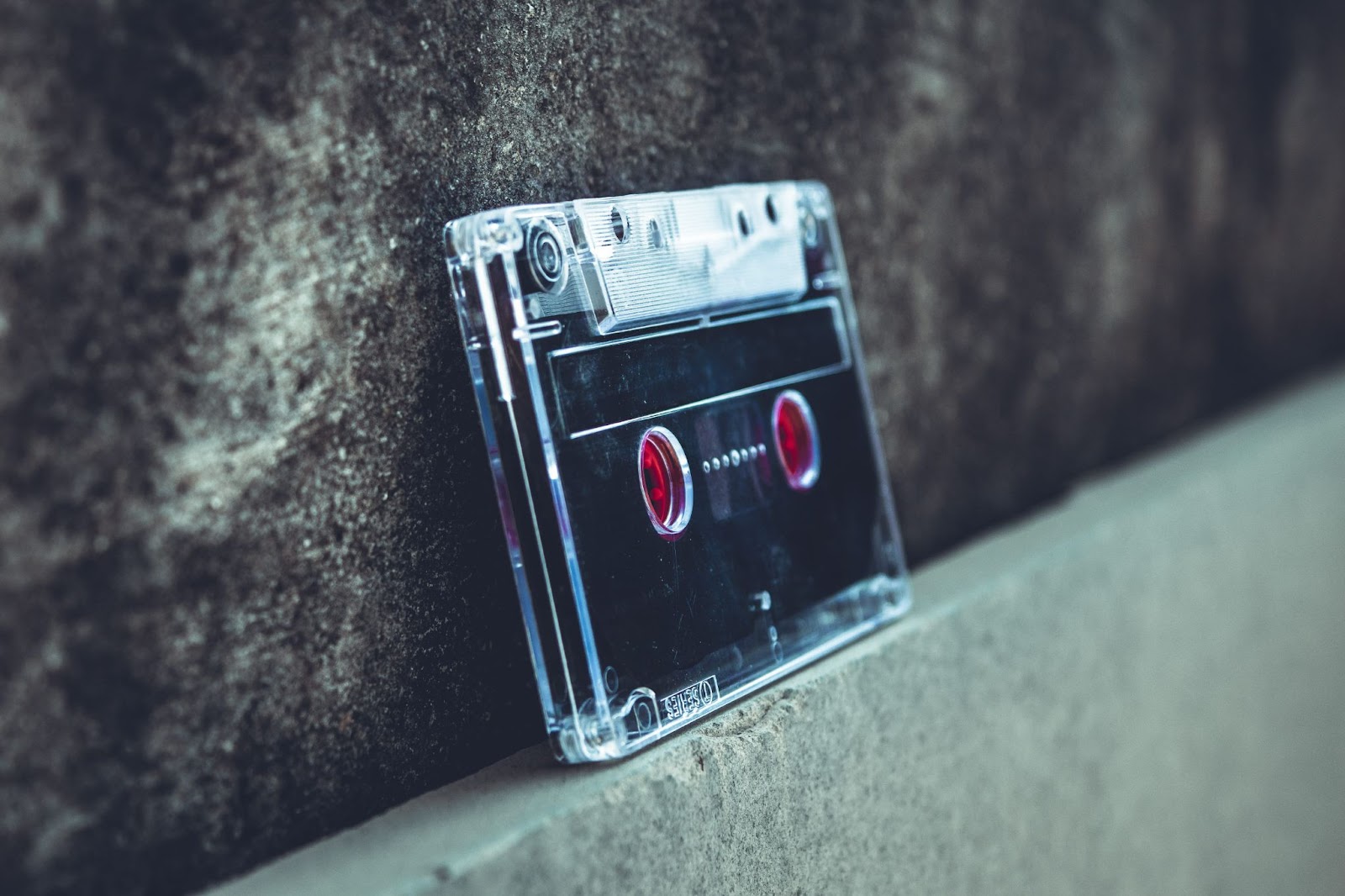 Cassette tape leaned on wall.