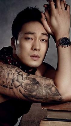 This contains an image of So Ji Sub