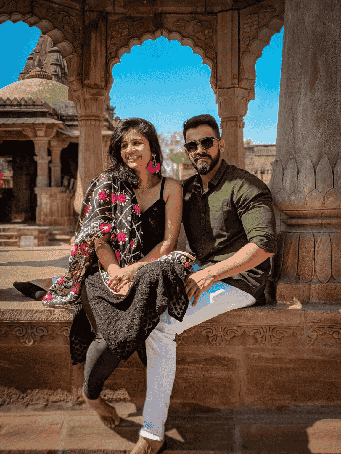 Scenic pre-wedding photoshoot in Jodhpur, capturing a couple’s joyful moment in a natural setting.