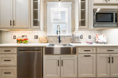 is a full house remodel worth it how to decide if its right for your family kitchen remodeling project with white cabinets and tile backsplash custom built michigan