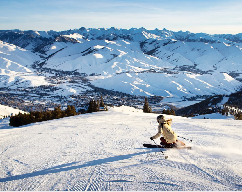 A person skiing down a mountain Description automatically generated