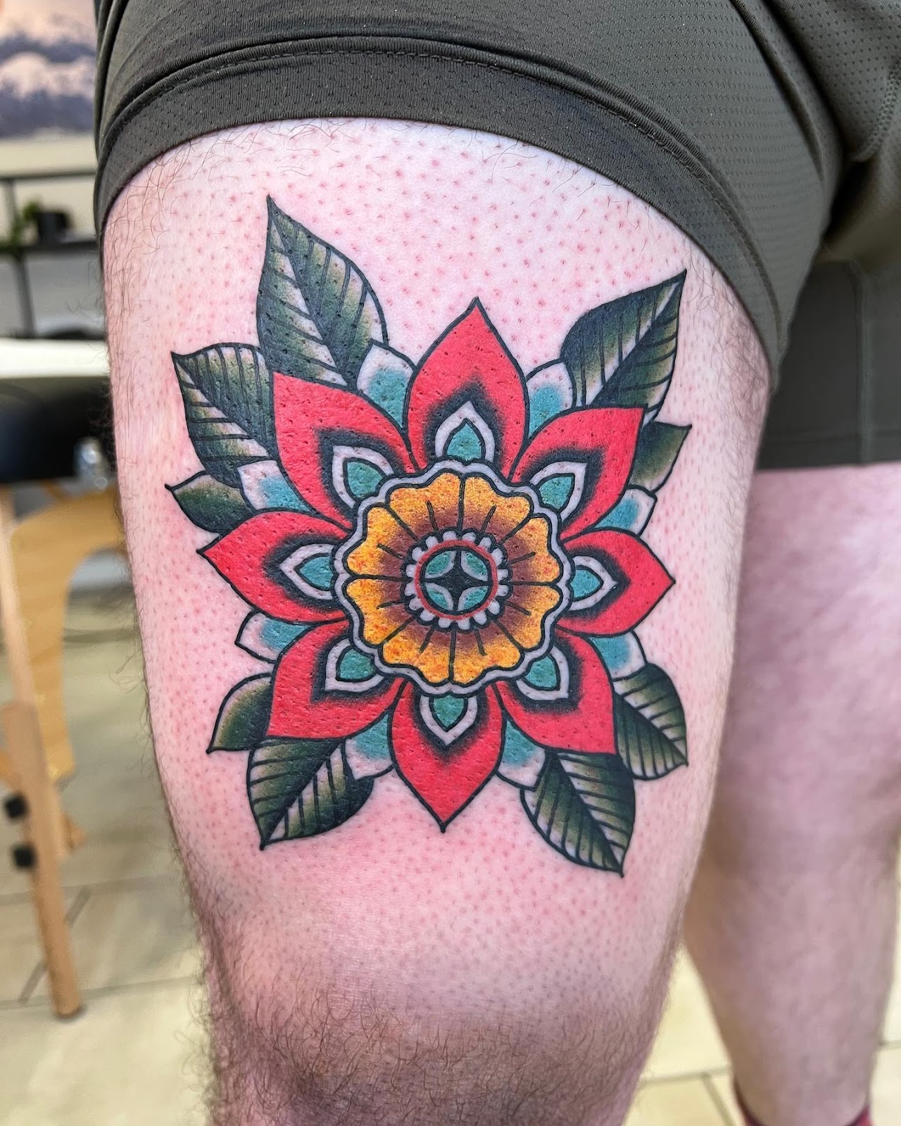 Timeless Traditional Thigh Tattoo