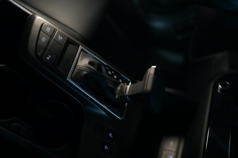 A close-up of a gear shift  Description automatically generated