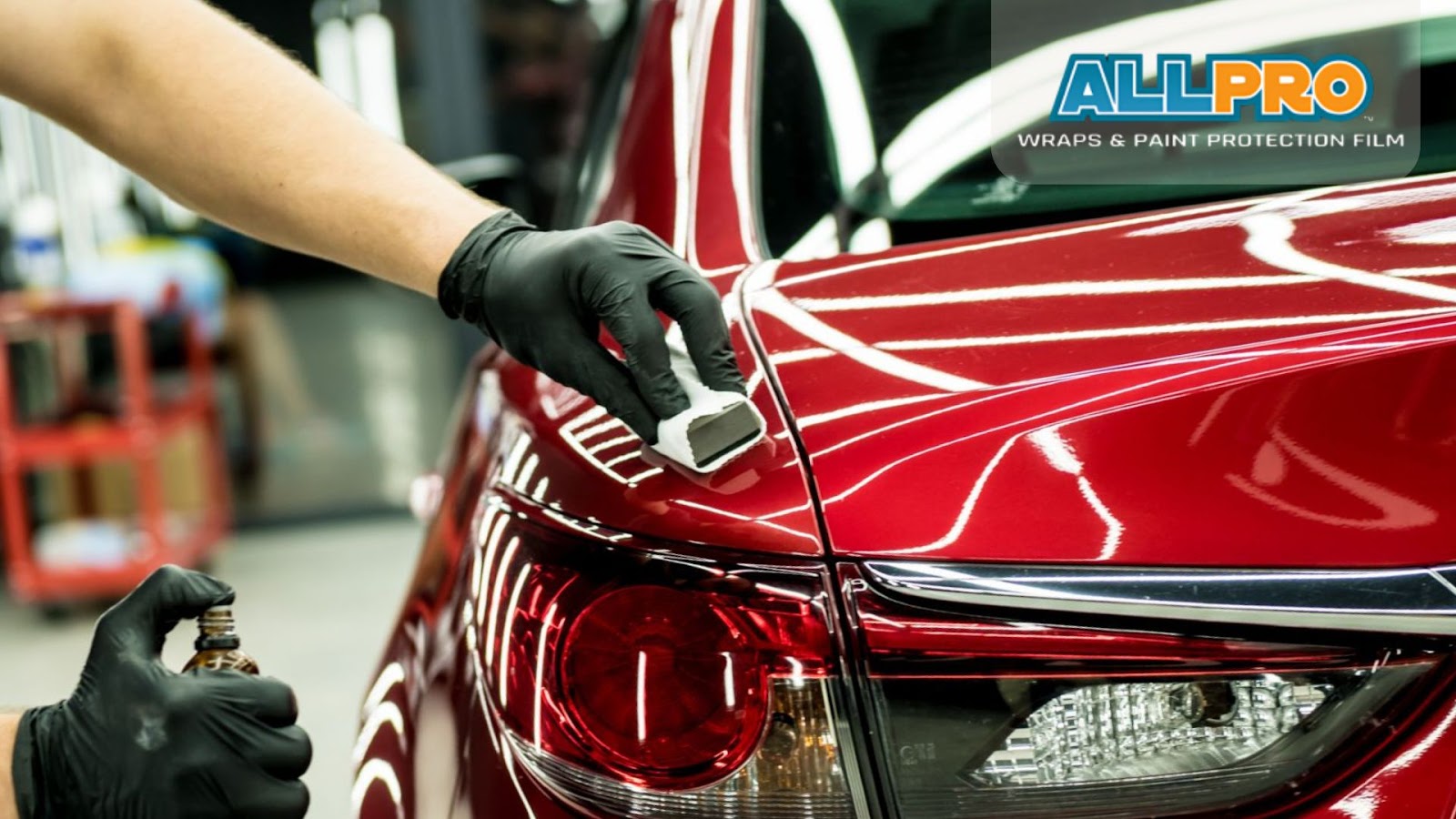 A shiny, polished car surface with ceramic coating, showcasing its glossy finish and protective layer