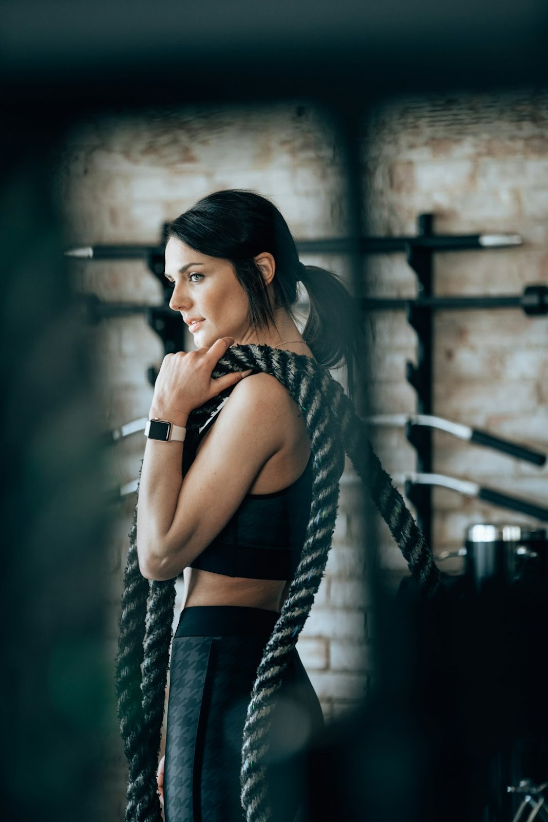 weights and protein shake on a gym floor