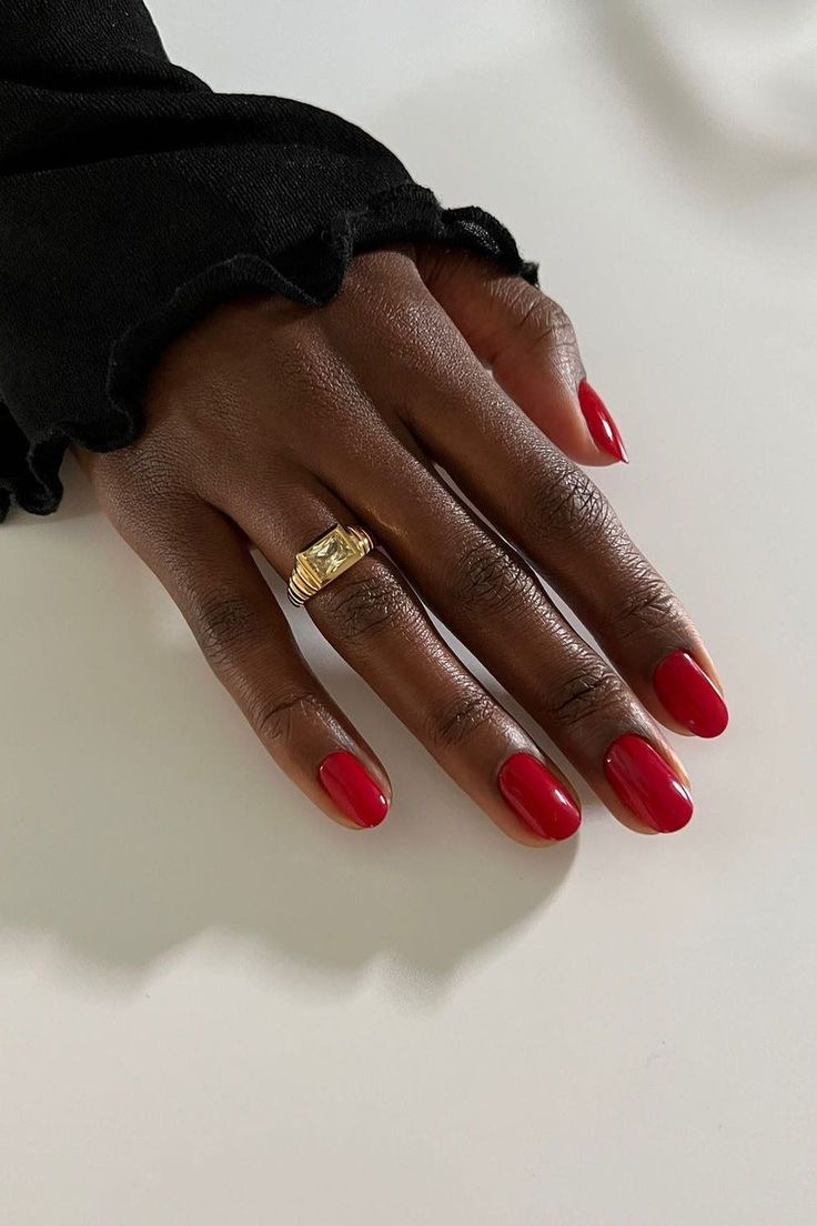 Alt Image credit: Close-up of elegant short red almond nails with a glossy finish, via BoredPanda.com