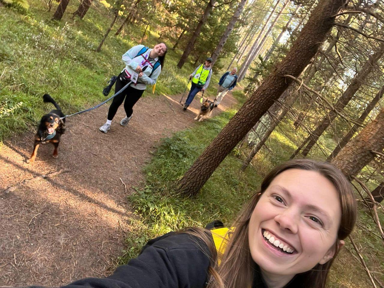 Both the Hannahs and Ludo the spaniel having some fun mid trail! Photo credit Hannah Vincent - affiliated TCSOT Trainer