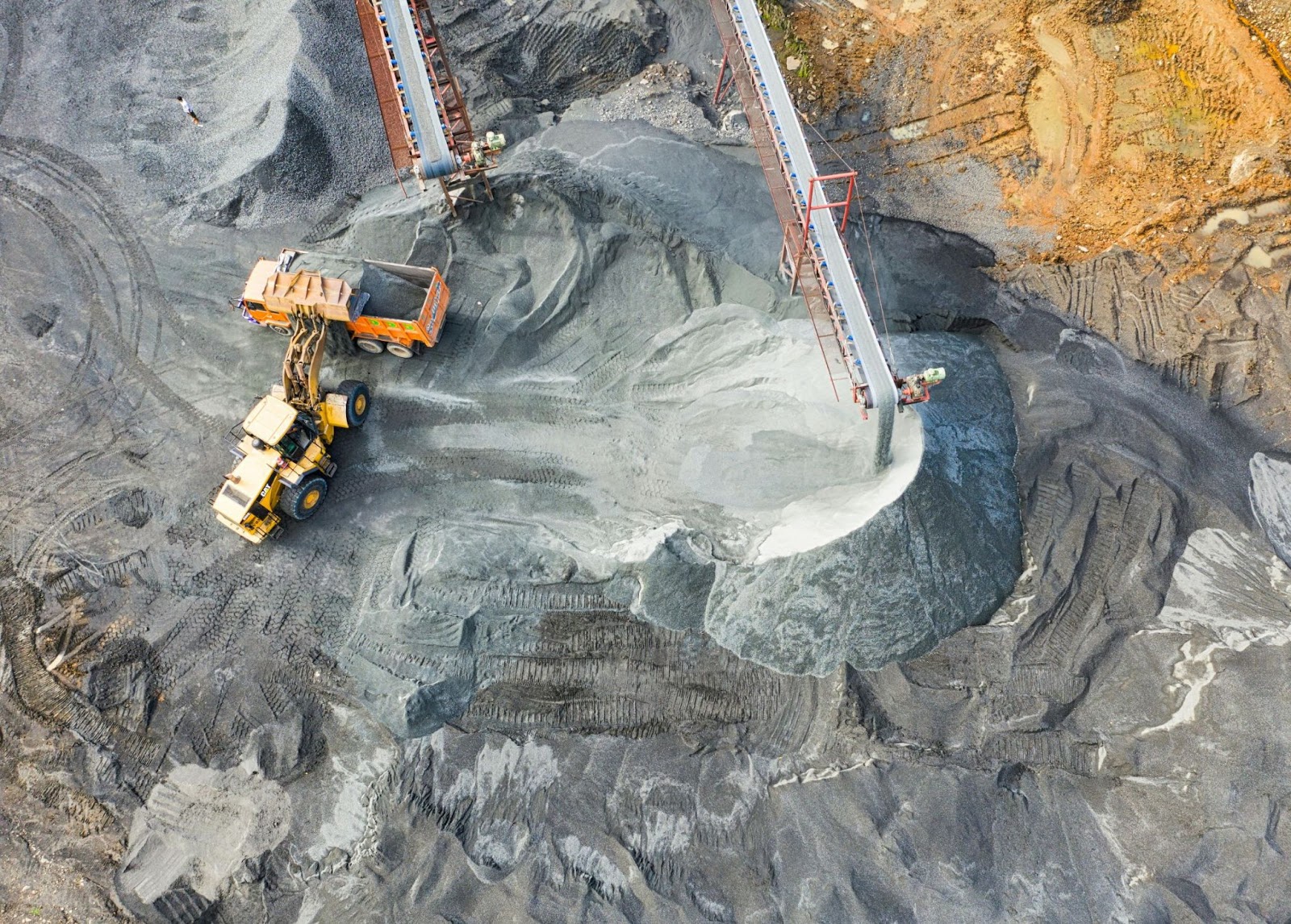 Aerial view of trucks working at a mining site