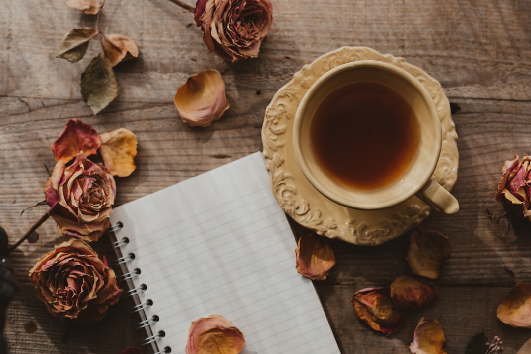 Person writing in a food journal