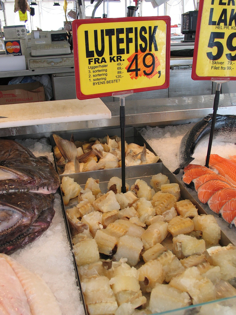 Popular Norway food lutefisk in tray for sell and price boards is there