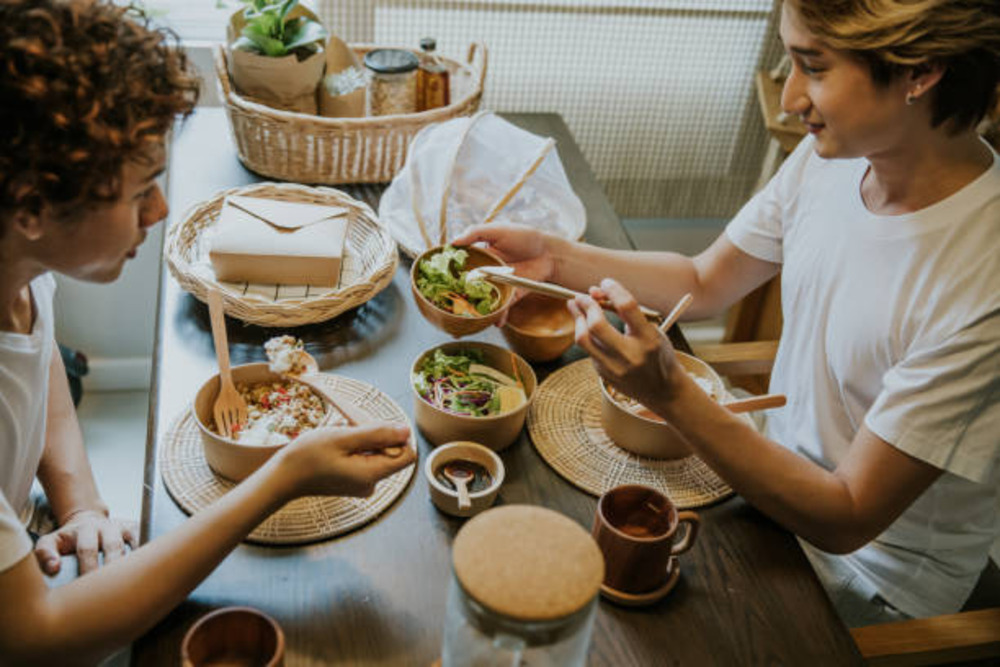 Customers using eco-friendly tableware in a restaurant. 