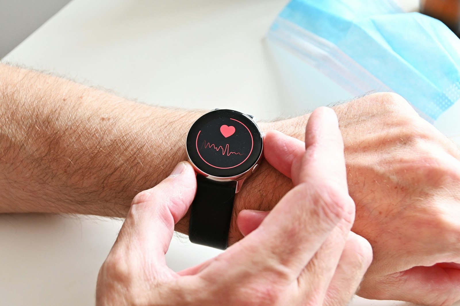 a person wearing a health tracking watch.