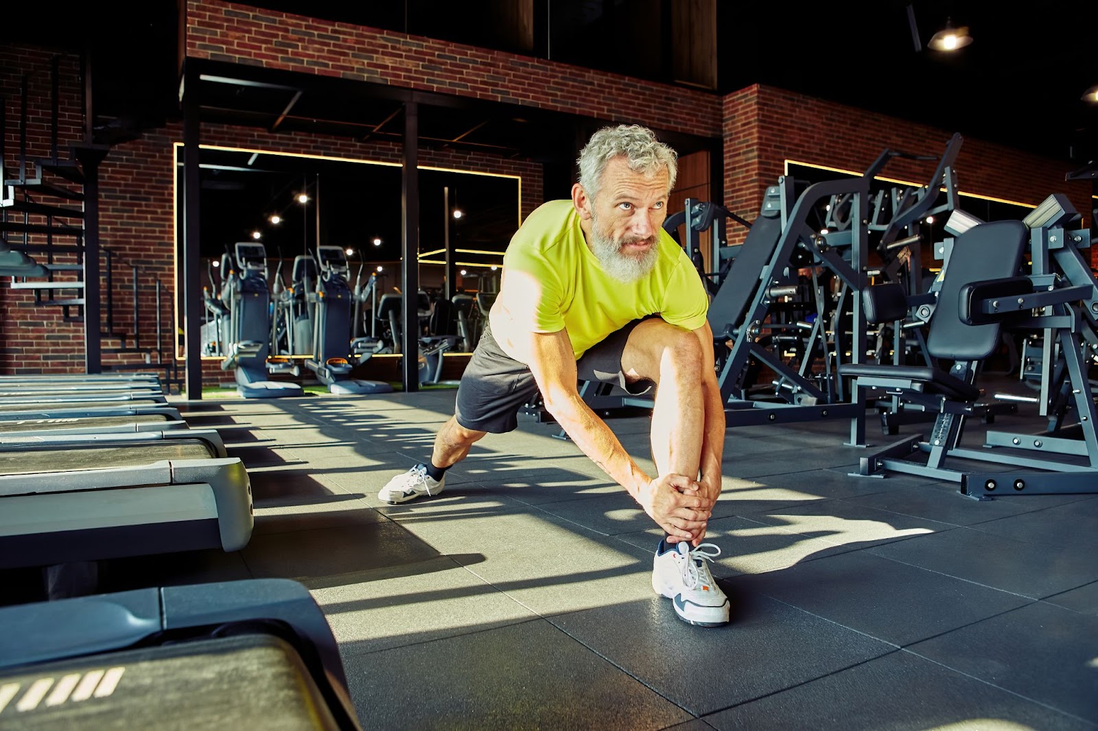 A man stretching before his workout.