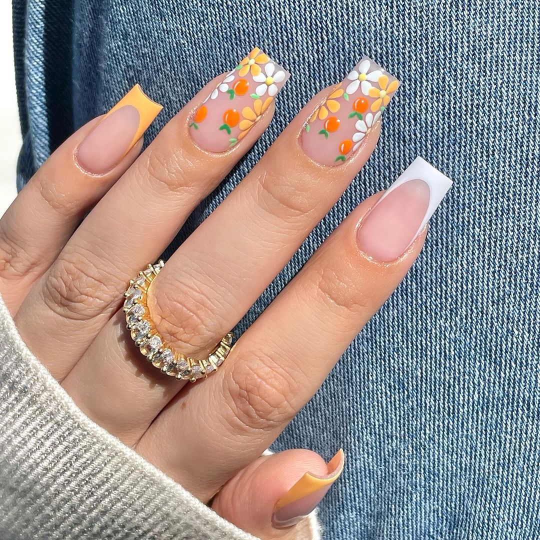 Close up of nails with glittery orange nails having Elegant Orange Wedding Guest Manicure