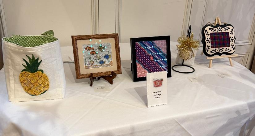 A group of framed pictures on a table

AI-generated content may be incorrect.