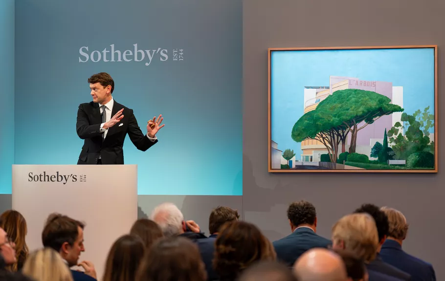  An auctioneer at Sotheby’s works to sell David Hockney’s L’Arbois, Sainte-Maxime.