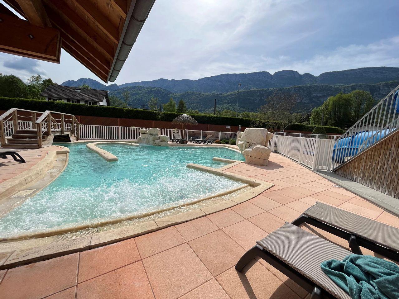 One of the 3 swimming pools and water slides at Lac Bleu Camp Site