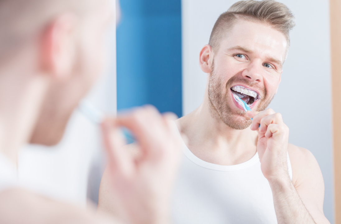 Person brushing teeth