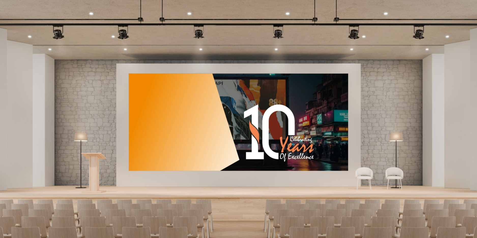 A large LED screen in an auditorium displaying "10 Years of Excellence," symbolizing the success of an advertising company in Qatar.