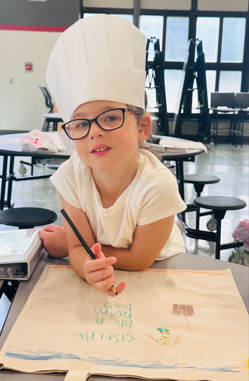 kid designing satchel