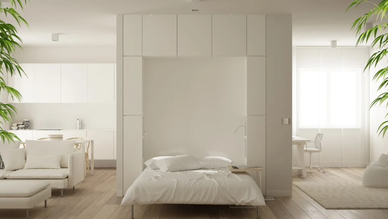 A white wall cabinet bed