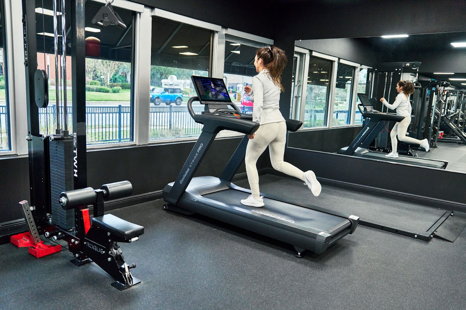 woman running on treadmill