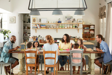 is a full house remodel worth it how to decide if its right for your family large families eating meal at long table next to kitchen custom built michigan