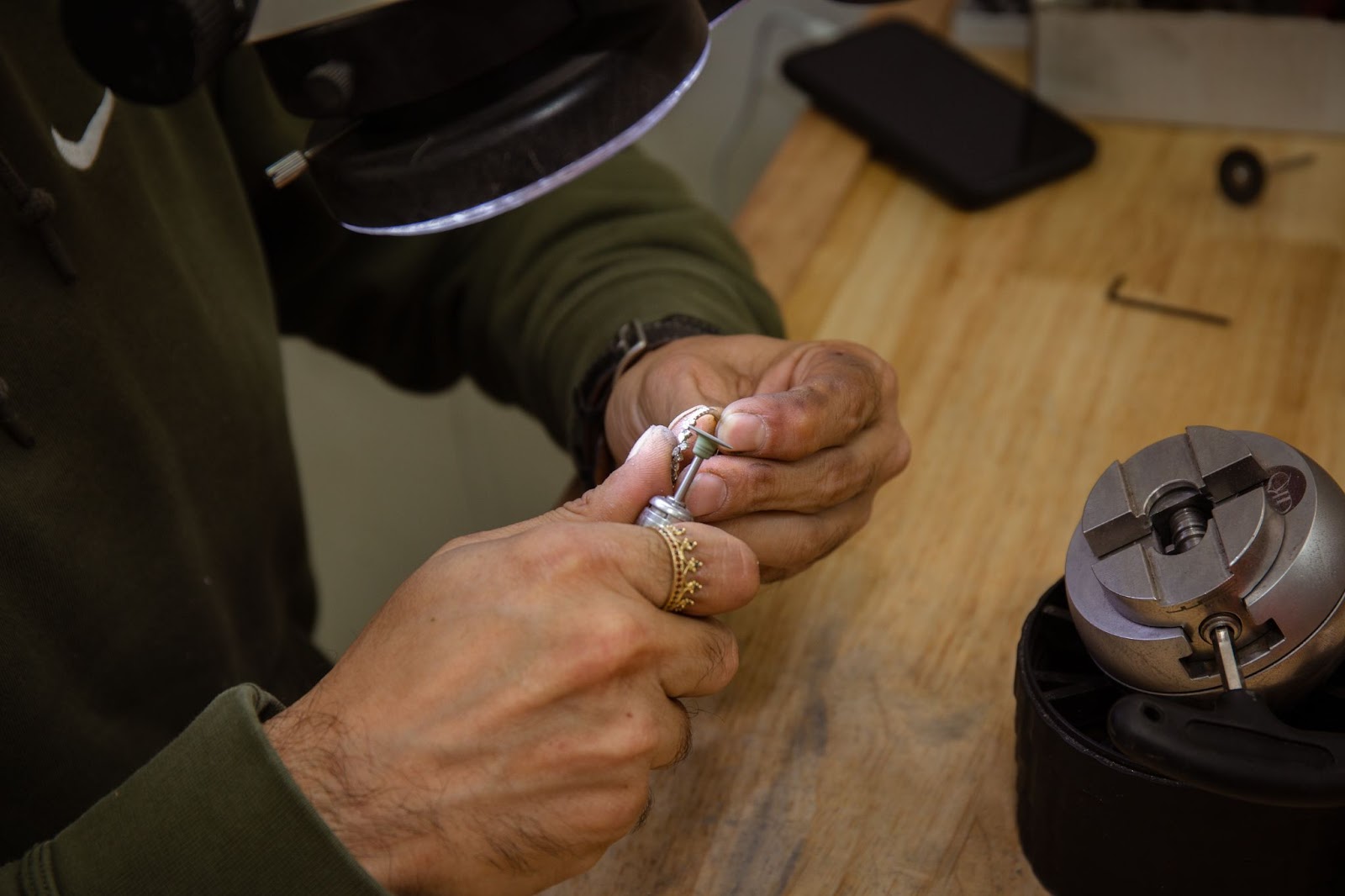 Jeweler working on a custom ring.