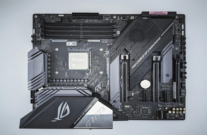 A modern PC motherboard with an AMD Ryzen CPU.






