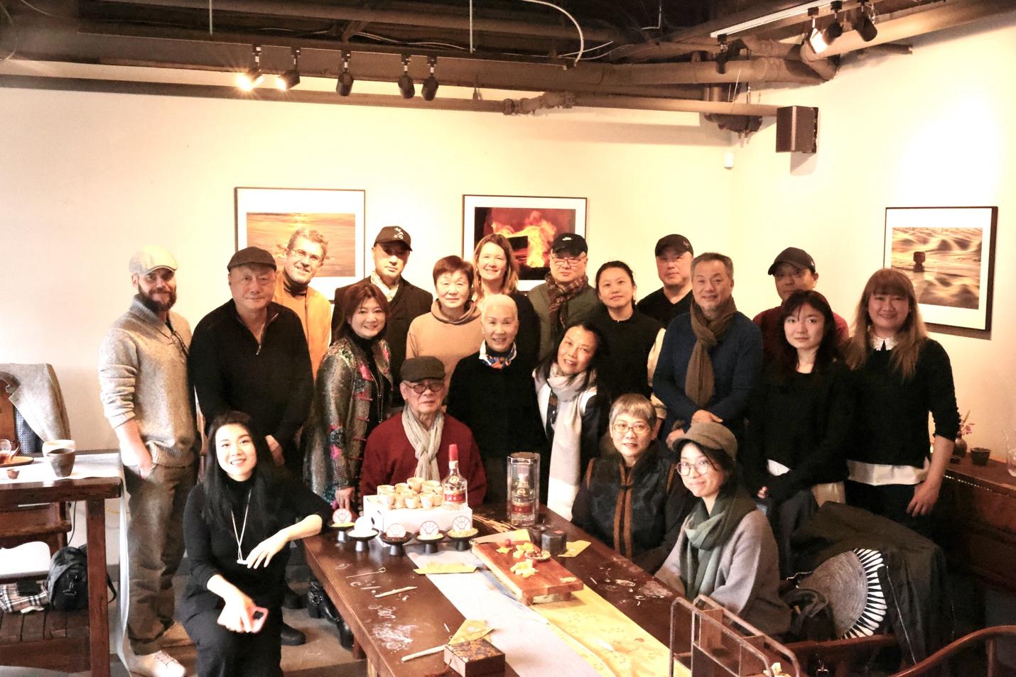 A group of people posing for a photo

AI-generated content may be incorrect.