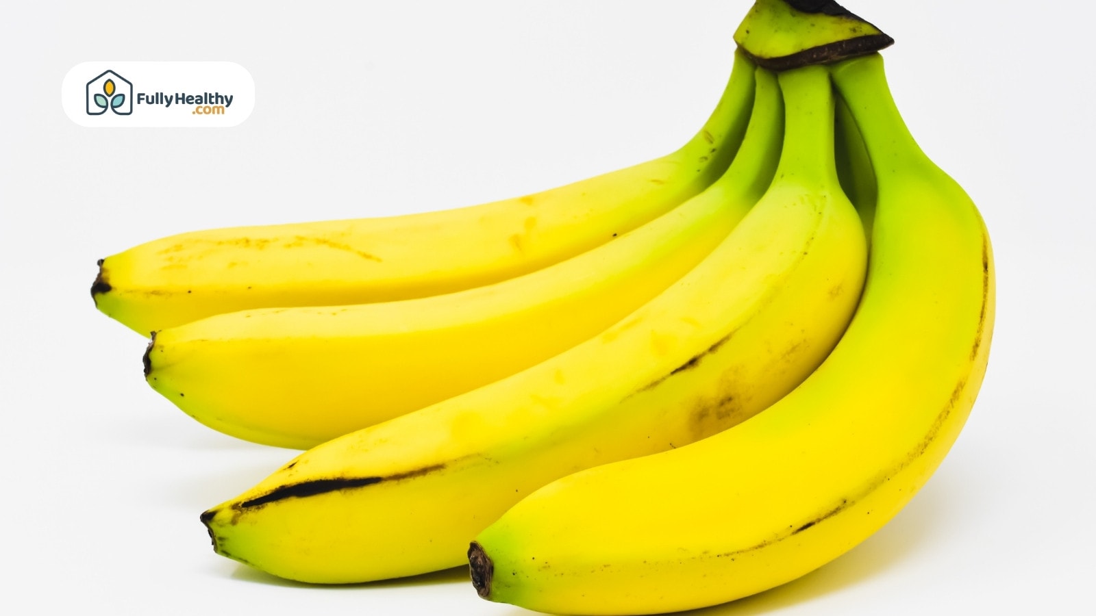 Bunch of ripe yellow bananas on white background
