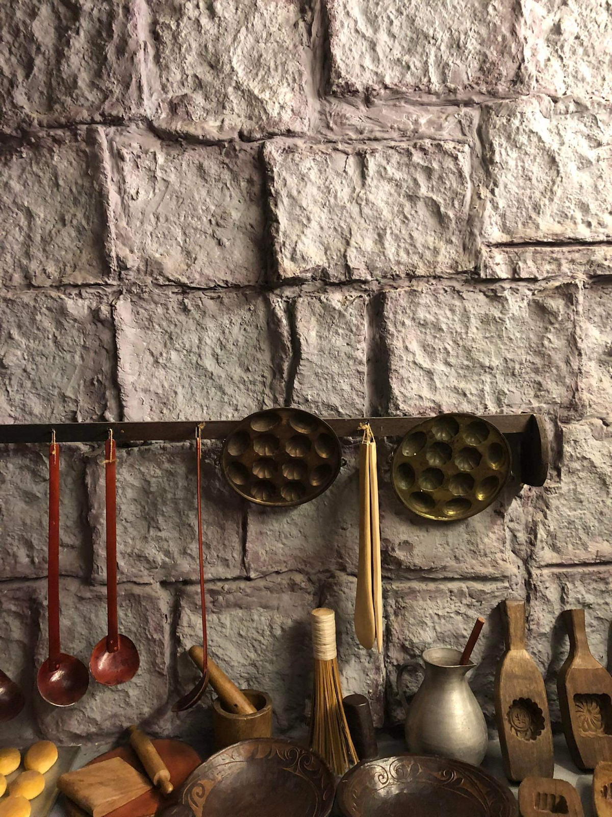 A photo of traditional Chinese cookware and utensils